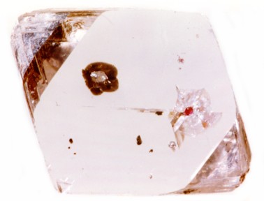 Figure 1: Inclusions of garnet and sulphides in octahedral diamond from the Udachnaya pipe, 18kb